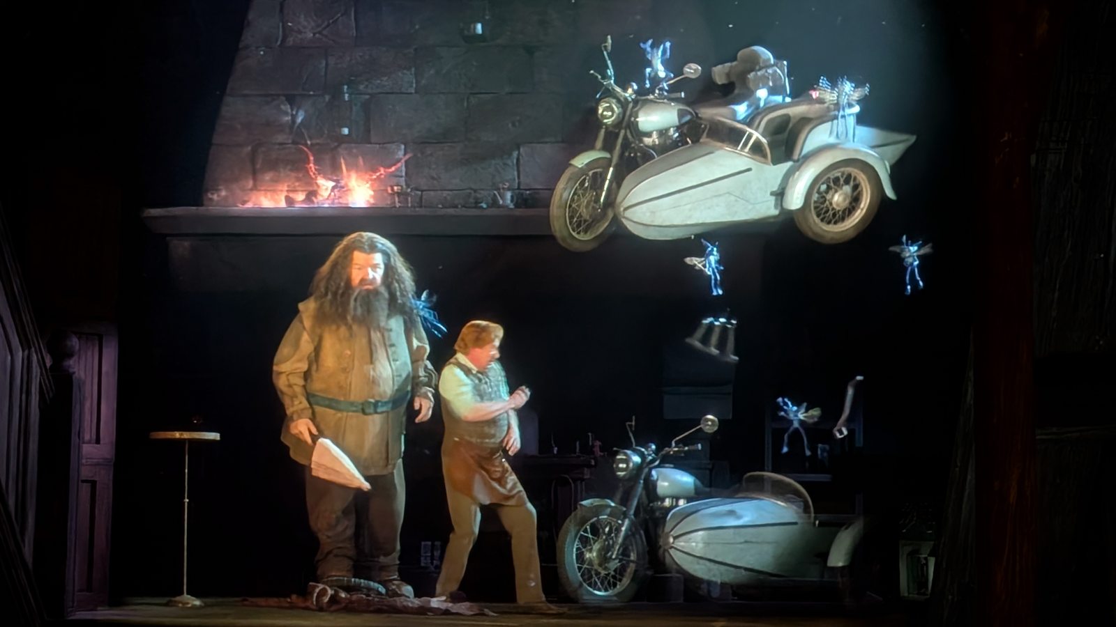 Hagrid and Arthur Weasley with the flying motorbike in the preshow.