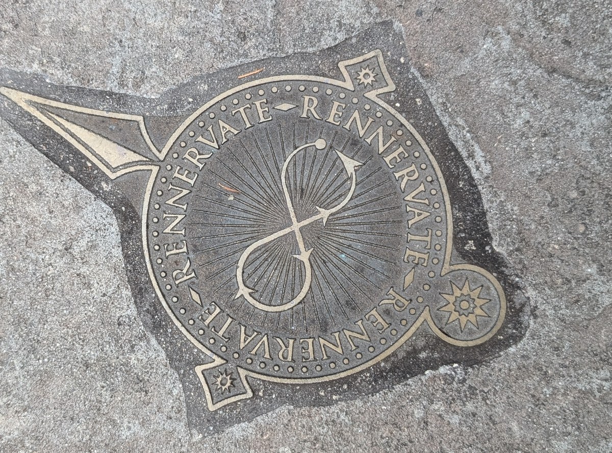 Rennervate medallion set into the pavement near the Triwizard stage
